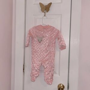 Light pink button up onesie